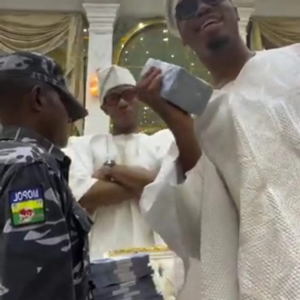 Police Detains Officer Caught in Viral Video of Naira Abuse by Son of Nigerian Billionaire Rasaq Okoya