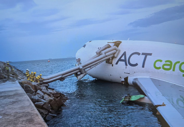 Two Dead at Hong Kong International Airport after Cargo Plane Skids Off Runway Into Sea