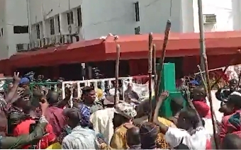 Tension at PDP Headquarters as Police Fire Teargas at Rioting Supporters