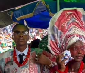 ‘Couple’ With Garments Sewn With Dangote Cement Wraps Catch Attentions at Ojude Oba