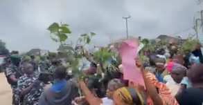 It’s Election Not War; Adeleke Supporters Chant Before Stern-Looking Policemen in Osun